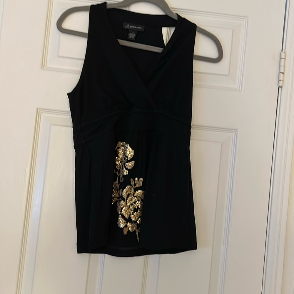 Black sleeveless blouse